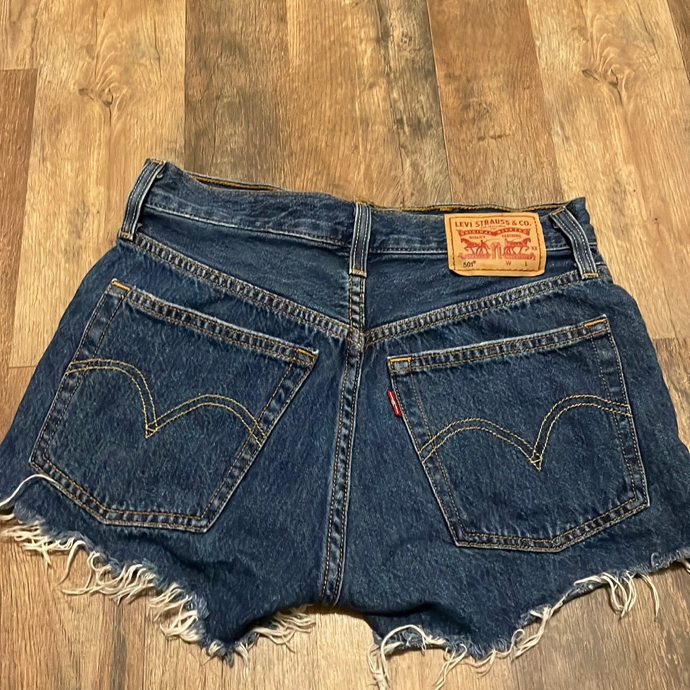 Size 24 denim shorts. Rip design
